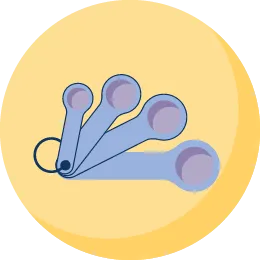 Illustration représentant un ensemble de quatre cuillères à mesurer.